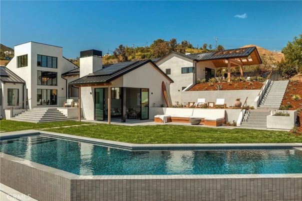 Exterior, Pool, Solar Panels