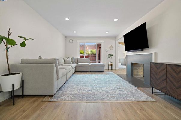 Fireplace, Interior, Living room, Recessed Lighting, Wood Texture Flooring