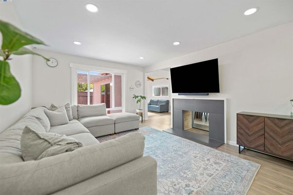 Fireplace, Interior, Living room, Recessed Lighting, Wood Texture Flooring