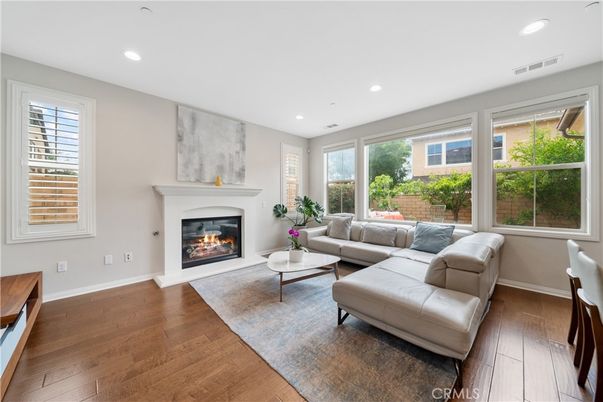 Fireplace, Interior, Living room, Recessed Lighting, Wood Texture Flooring