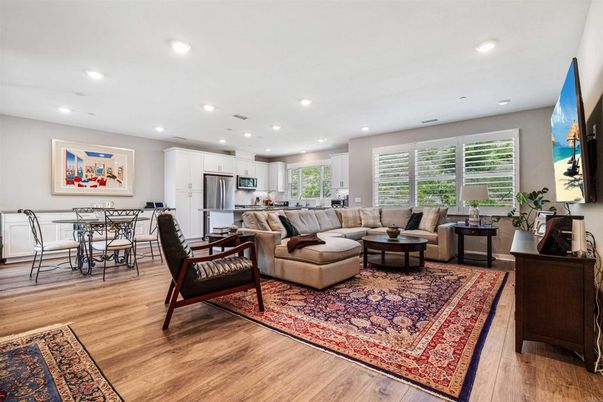 Dining room, Interior, Kitchen, Living room, Recessed Lighting, Stainless Steel Appliances, Wood Texture Flooring