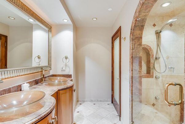 Bathroom, Dual Sink Vanities, Glass Shower, Interior, Recessed Lighting, Tile Countertops