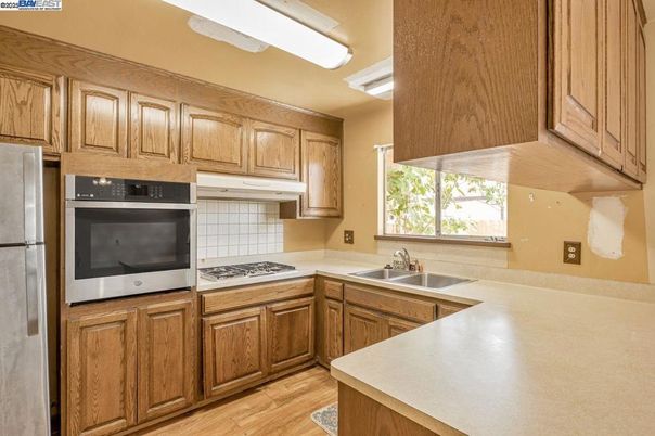 Interior, Kitchen, Tile Countertops, Wood Texture Flooring