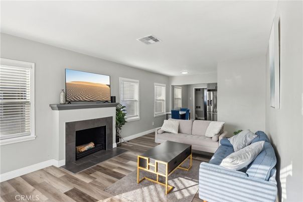 Fireplace, Interior, Living room, Recessed Lighting, Wood Texture Flooring