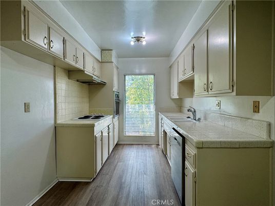 Interior, Kitchen, Tile Countertops, Wood Texture Flooring