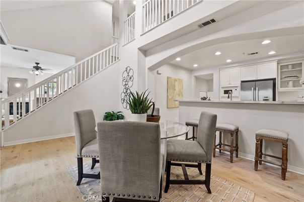 Dining room, Interior, Kitchen, Recessed Lighting, Stainless Steel Appliances, Wood Texture Flooring