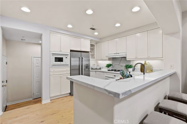 Interior, Kitchen, Recessed Lighting, Stainless Steel Appliances, Wood Texture Flooring
