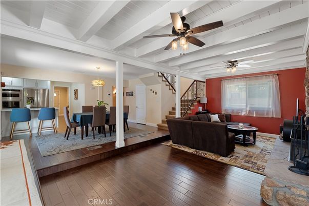 Chandelier, Dining room, Interior, Kitchen, Living room, Stainless Steel Appliances, Wood Texture Flooring