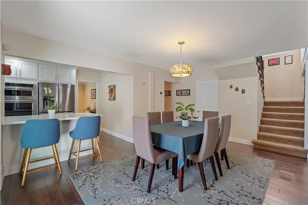 Dining room, Interior, Kitchen, Pendant Lights, Stainless Steel Appliances, Wood Texture Flooring