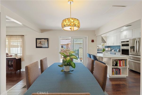 Dining room, Interior, Kitchen, Pendant Lights, Recessed Lighting, Stainless Steel Appliances, Wood Texture Flooring