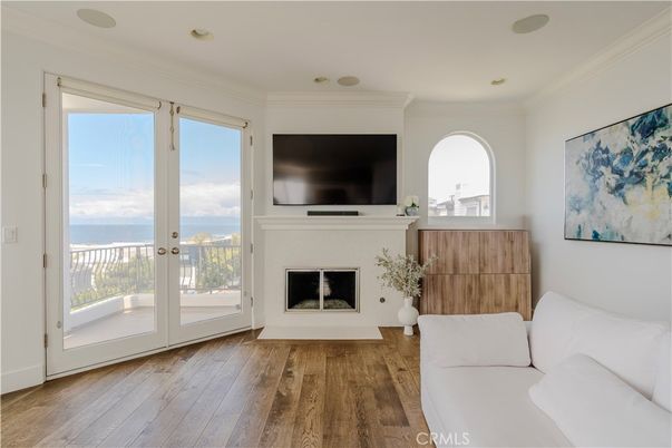 Fireplace, Interior, Recessed Lighting, Water, Wood Texture Flooring