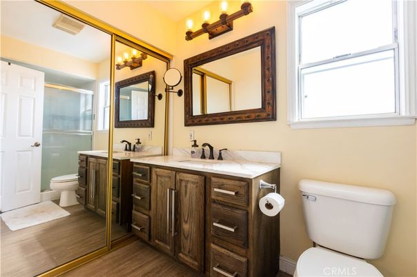 Bathroom, Dual Sink Vanities, Glass Shower, Interior, Wood Texture Flooring