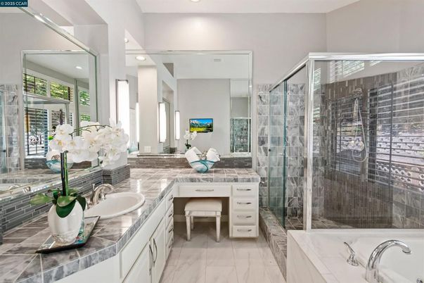 Bathroom, Dual Sink Vanities, Glass Shower, Interior, Marble, Recessed Lighting, Tile Countertops