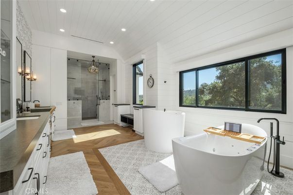 Bathroom, Free Standing Baths, Glass Shower, Interior, Recessed Lighting, Wood Texture Flooring