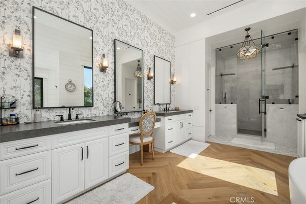 Bathroom, Dual Sink Vanities, Glass Shower, Interior, Recessed Lighting, Wood Texture Flooring