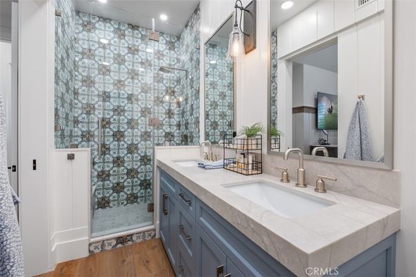 Bathroom, Dual Sink Vanities, Glass Shower, Interior, Recessed Lighting, Wood Texture Flooring