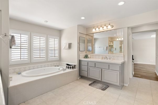 Bathroom, Dual Sink Vanities, Interior, Recessed Lighting, Wood Texture Flooring