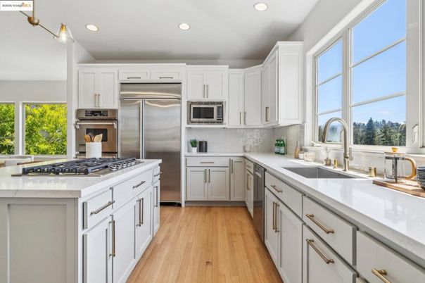 Interior, Kitchen, Recessed Lighting, Stainless Steel Appliances, Wood Texture Flooring