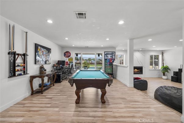 Billiard Table, Fireplace, Game Room, Interior, Recessed Lighting, Wood Texture Flooring