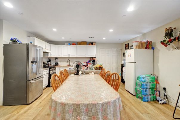 Dining room, Interior, Kitchen, Recessed Lighting, Stainless Steel Appliances, Wood Texture Flooring