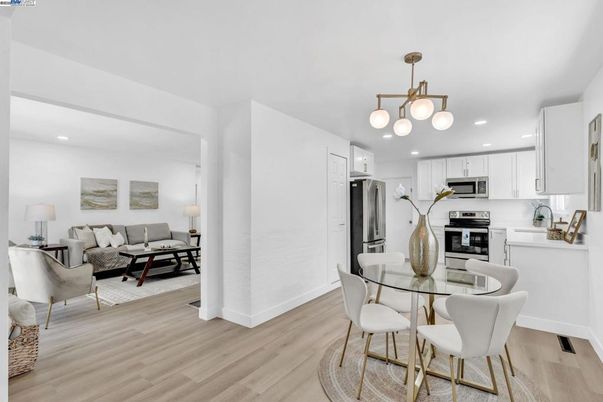 Dining room, Interior, Kitchen, Living room, Pendant Lights, Recessed Lighting, Stainless Steel Appliances, Wood Texture Flooring
