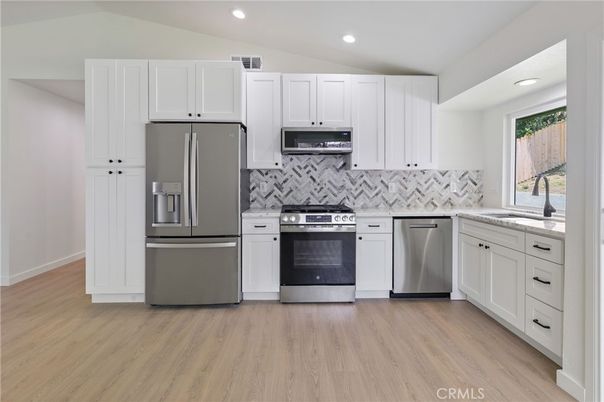 Interior, Kitchen, Recessed Lighting, Stainless Steel Appliances, Wood Texture Flooring