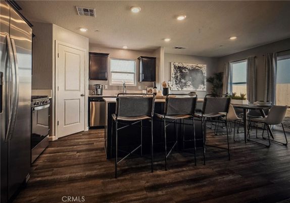 Dining room, Interior, Kitchen, Recessed Lighting, Stainless Steel Appliances, Wood Texture Flooring