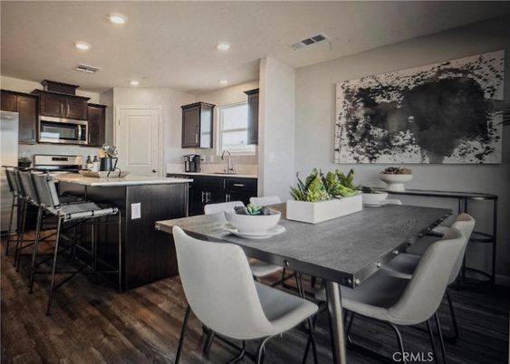 Dining room, Interior, Kitchen, Recessed Lighting, Stainless Steel Appliances, Wood Texture Flooring