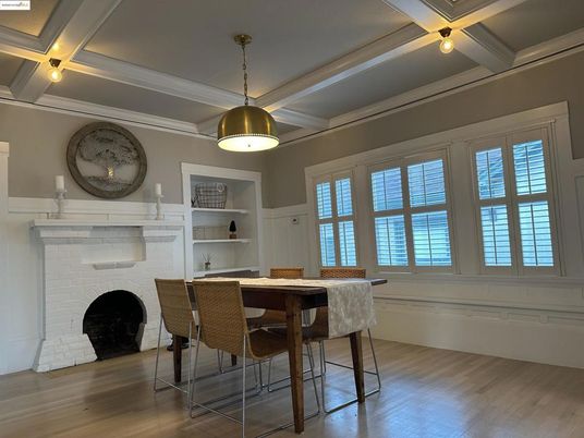 Dining room, Fireplace, Interior, Pendant Lights, Wood Texture Flooring