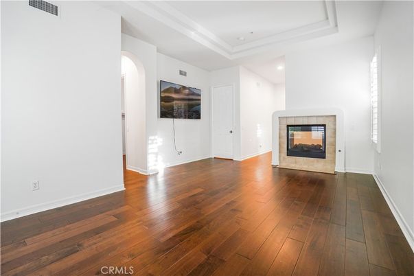 Empty room, Fireplace, Interior, Recessed Lighting, Wood Texture Flooring