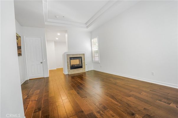 Empty room, Fireplace, Interior, Recessed Lighting, Wood Texture Flooring