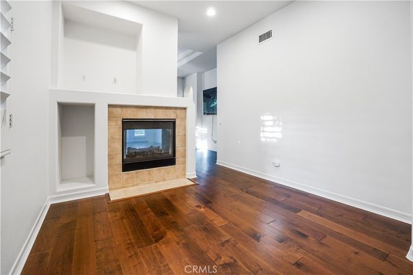 Empty room, Fireplace, Interior, Recessed Lighting, Wood Texture Flooring