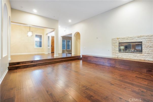 Empty room, Fireplace, Interior, Pendant Lights, Recessed Lighting, Wood Texture Flooring