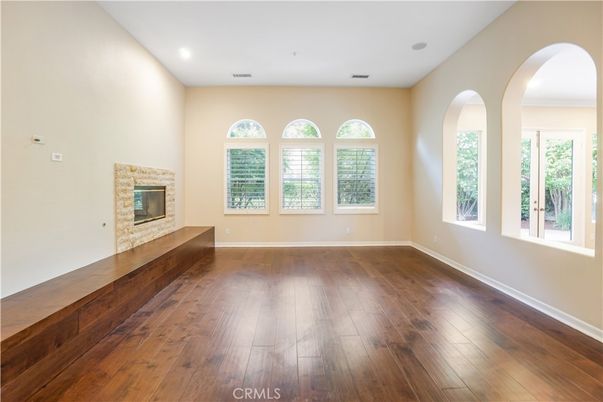 Empty room, Fireplace, Interior, Recessed Lighting, Wood Texture Flooring