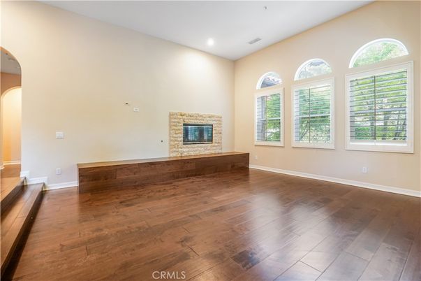 Empty room, Fireplace, Interior, Recessed Lighting, Wood Texture Flooring