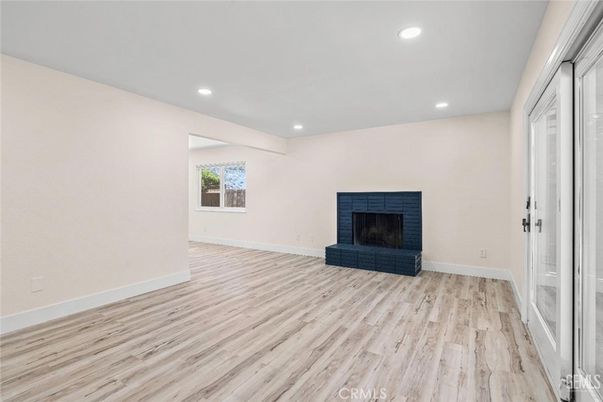 Empty room, Fireplace, Interior, Recessed Lighting, Wood Texture Flooring