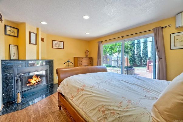 Bedroom, Fireplace, Interior, Recessed Lighting, Wood Texture Flooring