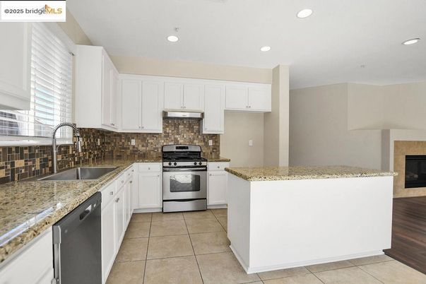Fireplace, Interior, Kitchen, Recessed Lighting, Stainless Steel Appliances