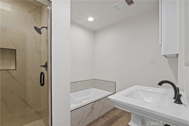 Bathroom, Glass Shower, Interior, Marble Walls, Recessed Lighting, Wood Texture Flooring