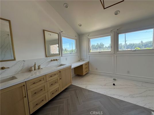 Bathroom, Dual Sink Vanities, Interior, Marble, Recessed Lighting, Wood Texture Flooring
