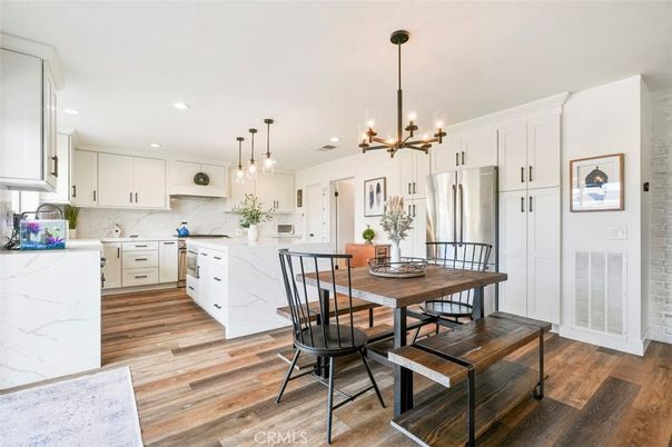 Dining room, Interior, Kitchen, Marble Walls, Pendant Lights, Recessed Lighting, Stainless Steel Appliances, Wood Texture Flooring