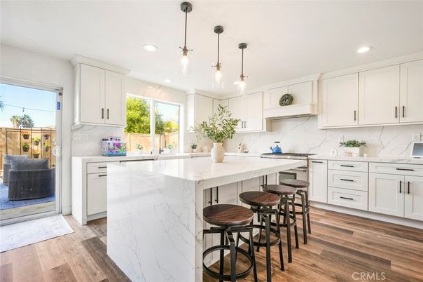 Interior, Kitchen, Marble Walls, Pendant Lights, Recessed Lighting, Wood Texture Flooring