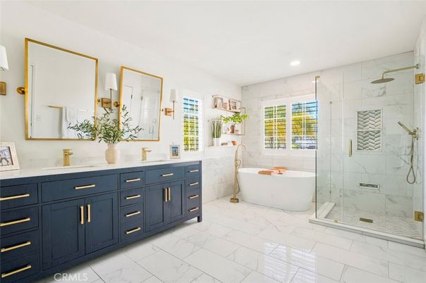 Bathroom, Dual Sink Vanities, Free Standing Baths, Glass Shower, Interior, Marble, Marble Walls, Recessed Lighting