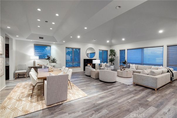 Dining room, Fireplace, Interior, Living room, Recessed Lighting, Wood Texture Flooring