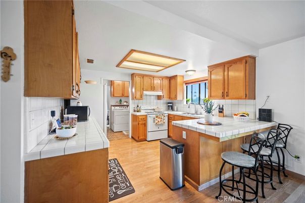 Interior, Kitchen, Tile Countertops, Wood Texture Flooring