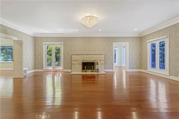 Chandelier, Empty room, Fireplace, Interior, Recessed Lighting, Wood Texture Flooring