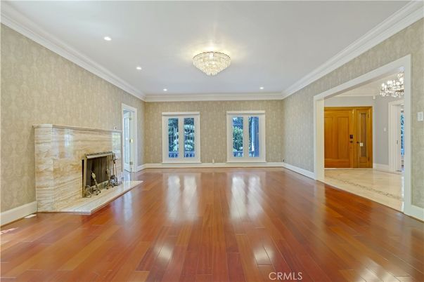 Chandelier, Empty room, Fireplace, Interior, Recessed Lighting, Wood Texture Flooring
