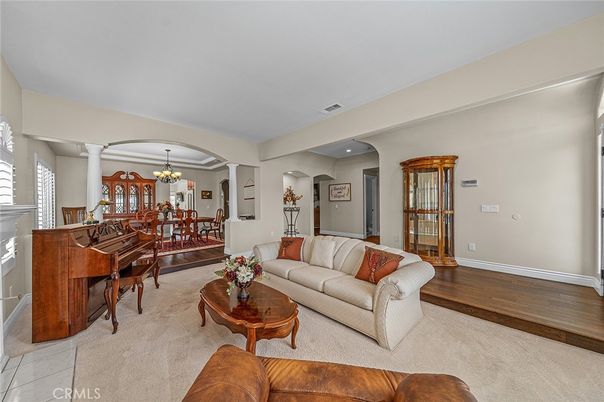Chandelier, Dining room, Interior, Living room, Piano, Recessed Lighting, Wood Texture Flooring