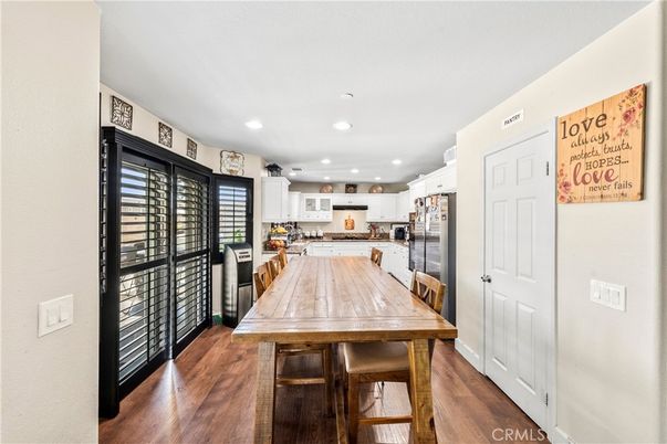 Dining room, Interior, Kitchen, Recessed Lighting, Stainless Steel Appliances, Wood Texture Flooring
