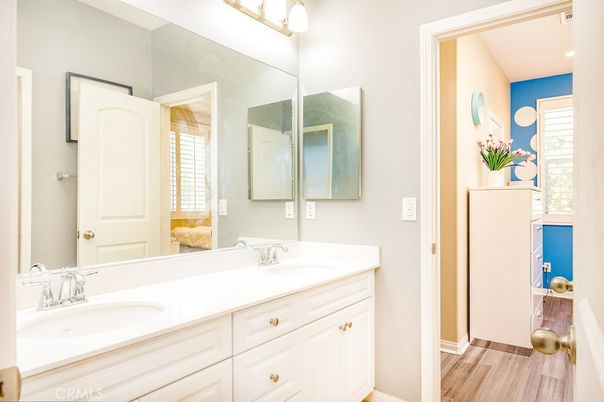 Bathroom, Dual Sink Vanities, Interior, Recessed Lighting, Wood Texture Flooring